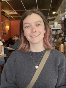A woman smiling. 